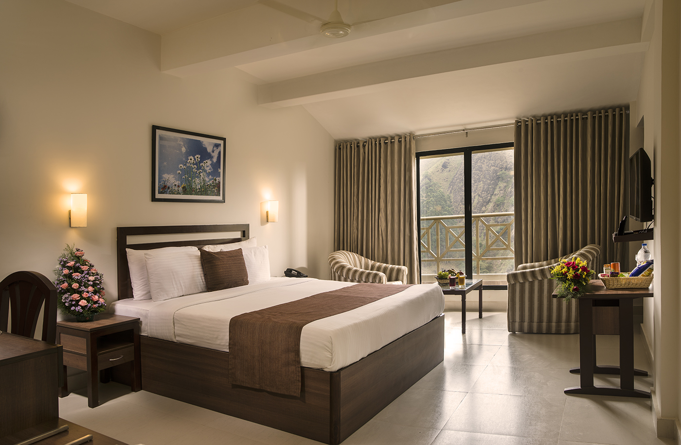 Balcony View Room with king bed at Abad Copper Castle