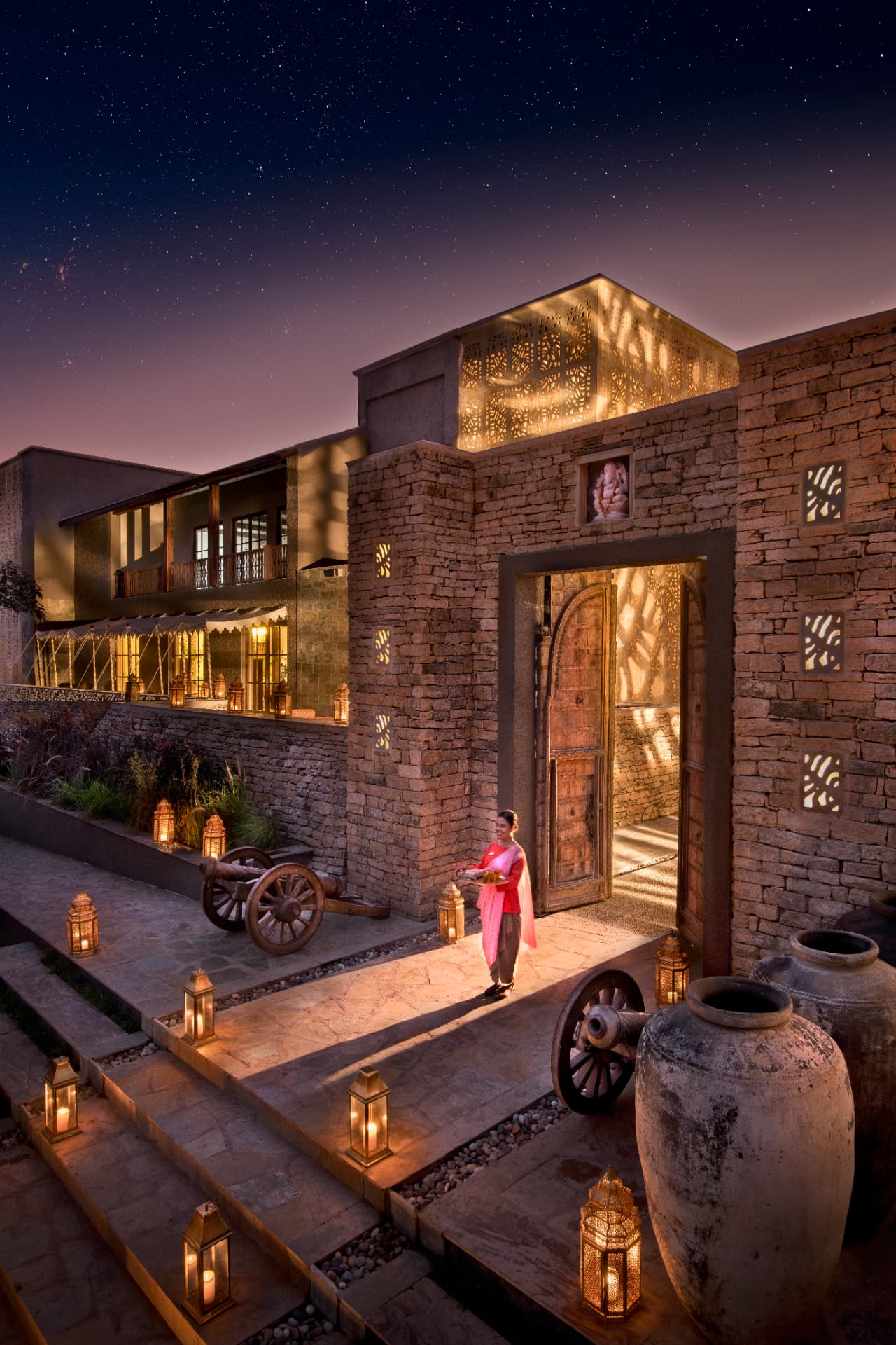 Lantern-lit arrival courtyard
