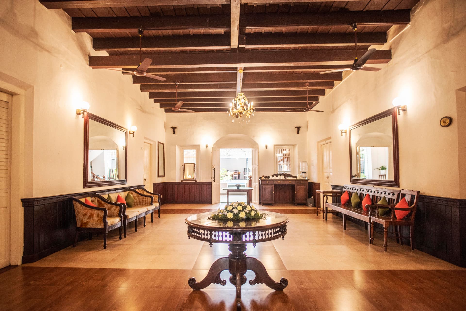 Timber-beamed reception hall with chandelier