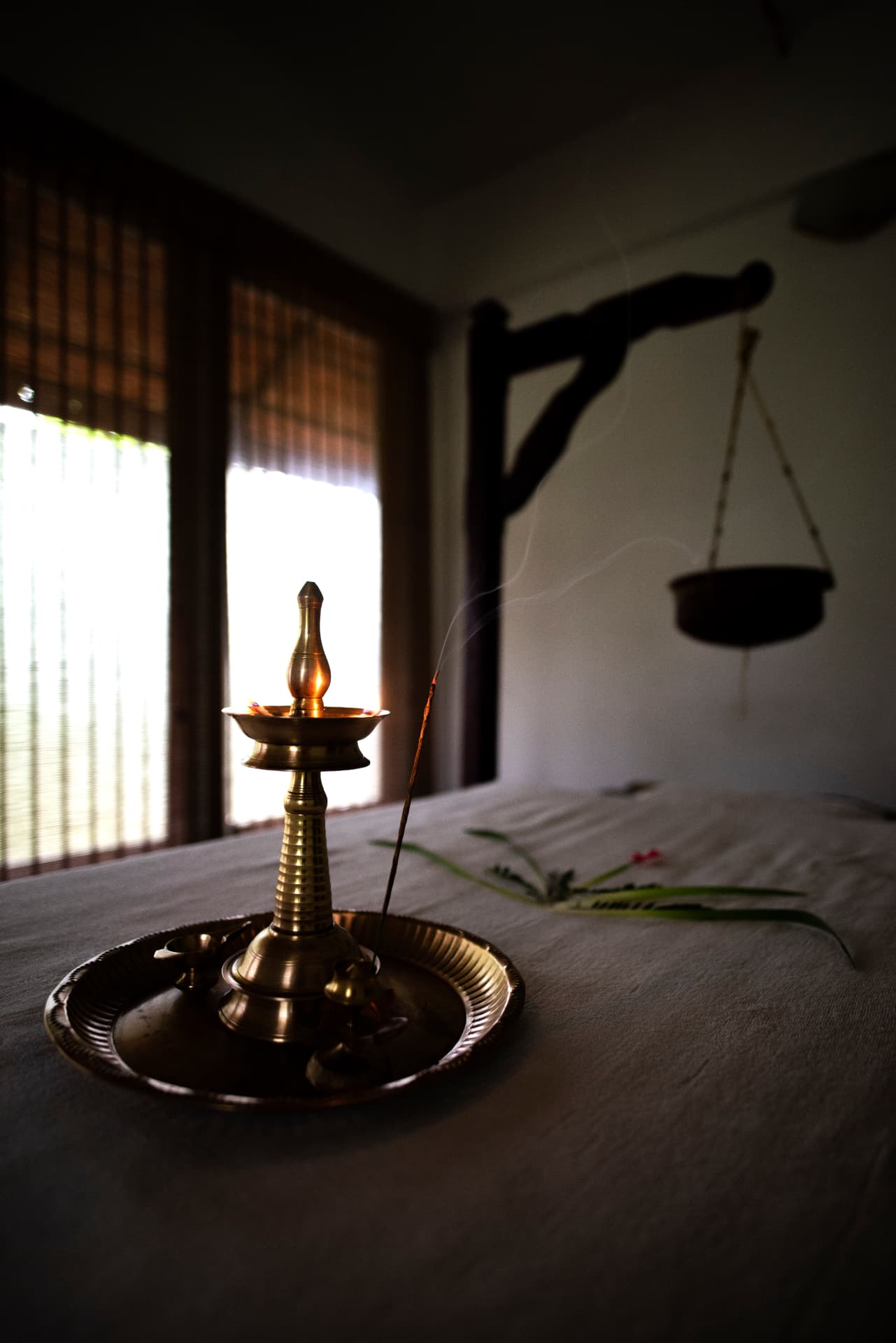 Brass lamp at the Ayurveda Centre – Abad Green Forest, Thekkady