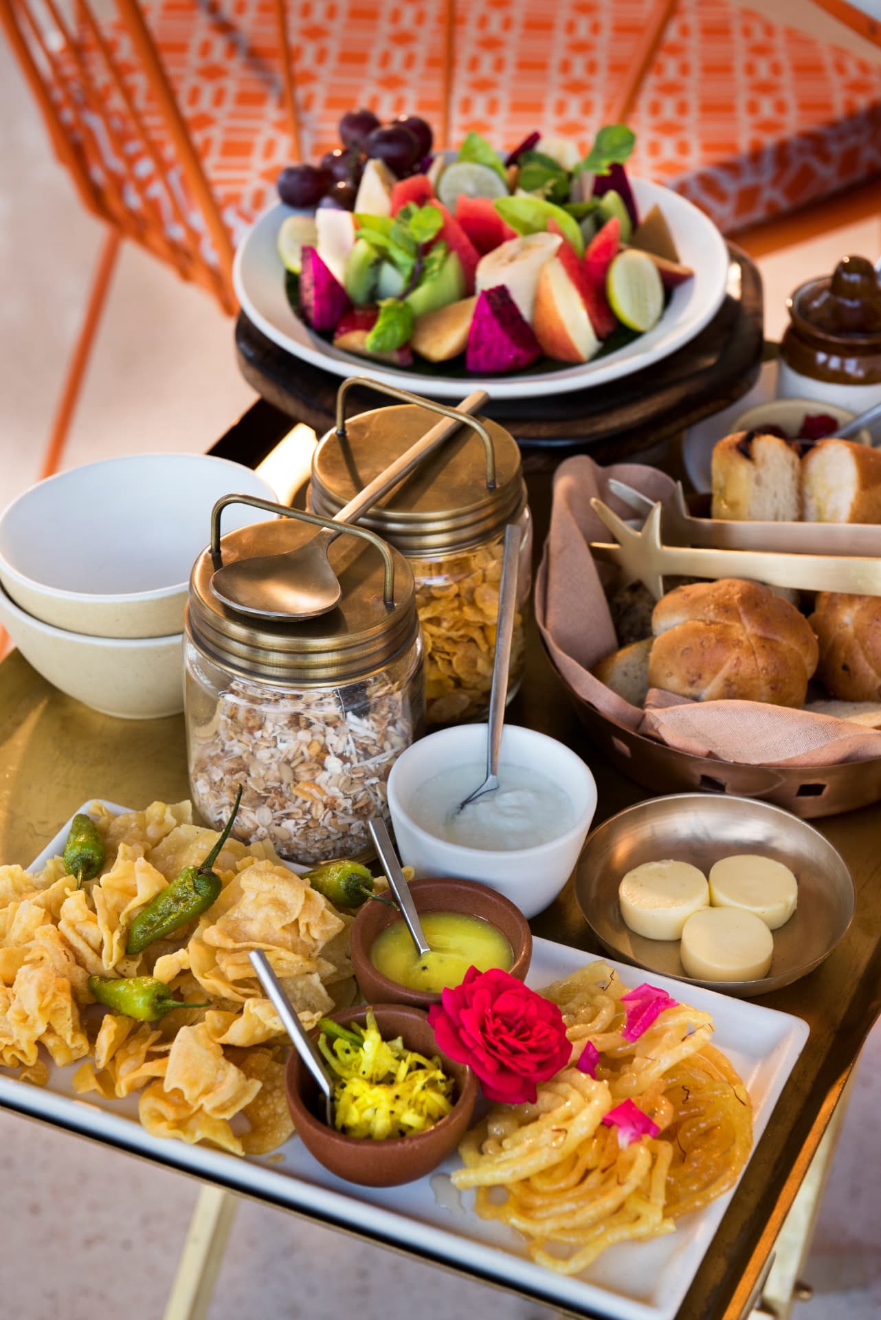 Breakfast trolley — fruit, granola, warm breads and jalebi