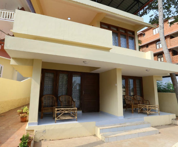 Abad Serviced Villas exterior with verandah seating, Lighthouse Road, Kovalam