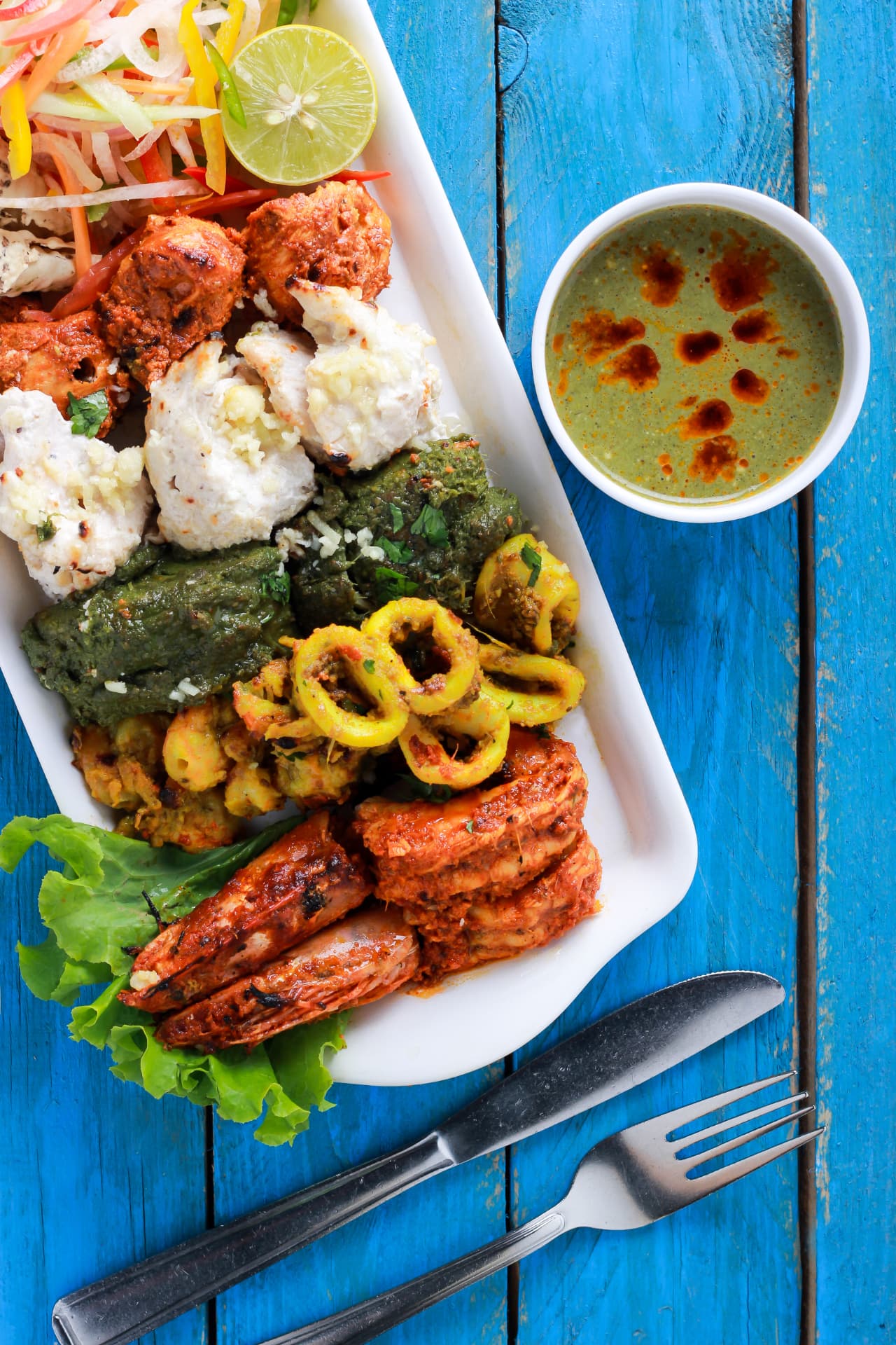 Kerala seafood grill platter with green chutney