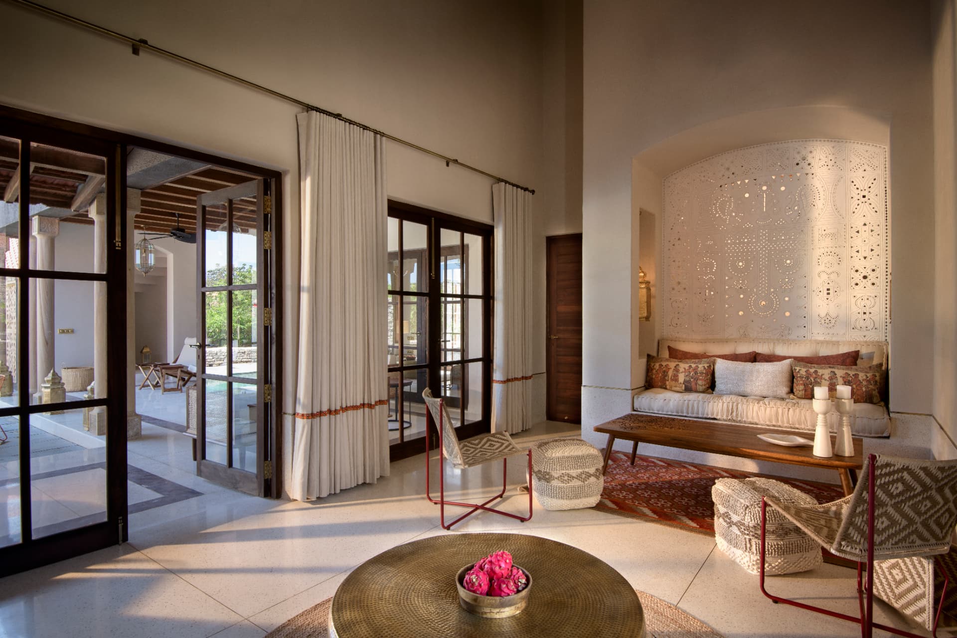 Verandah lounge opening to the courtyard — Aramness Gir, Gujarat