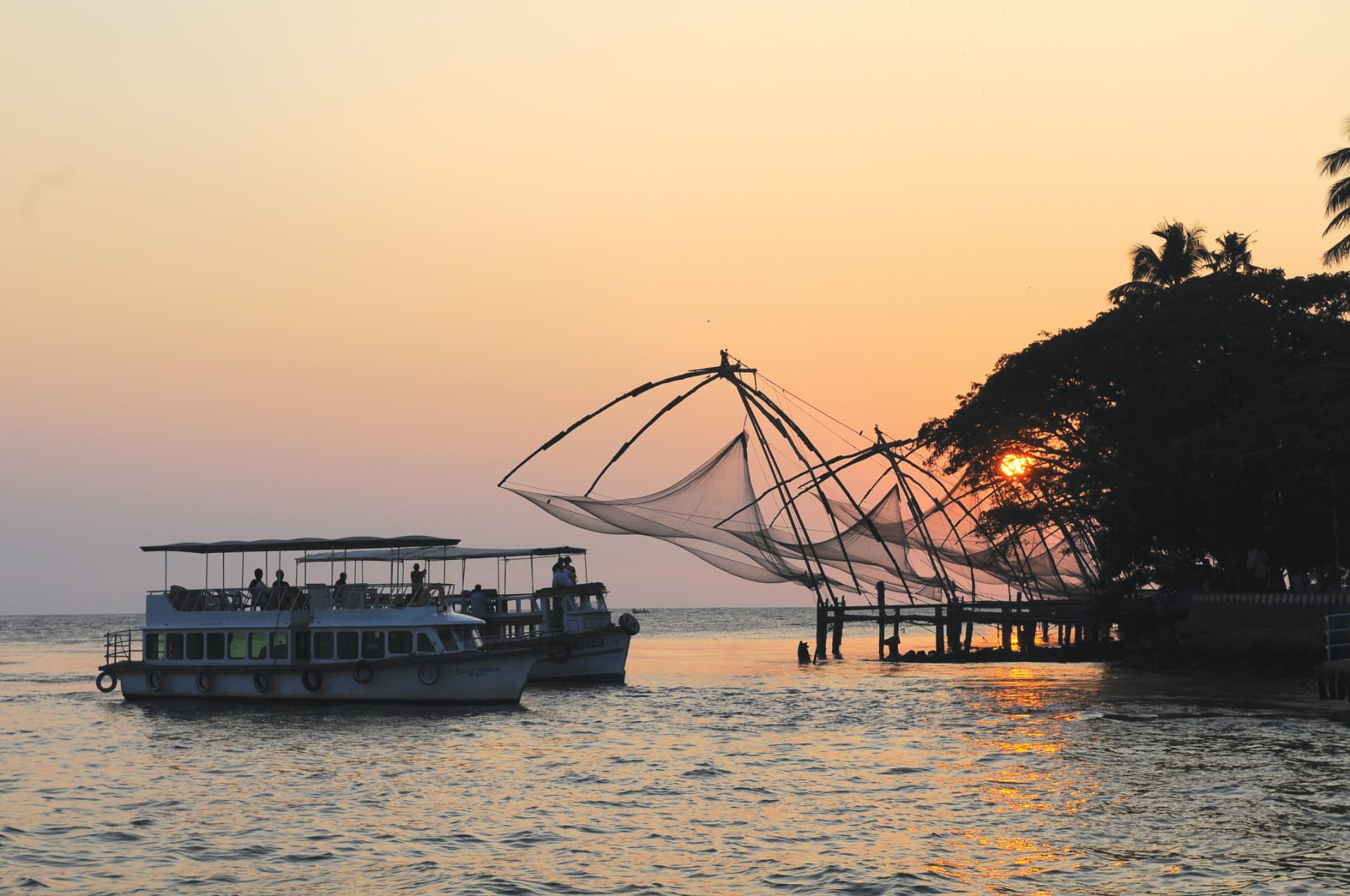 Chinese fishing nets at sunset near Abad Fort, Kochi