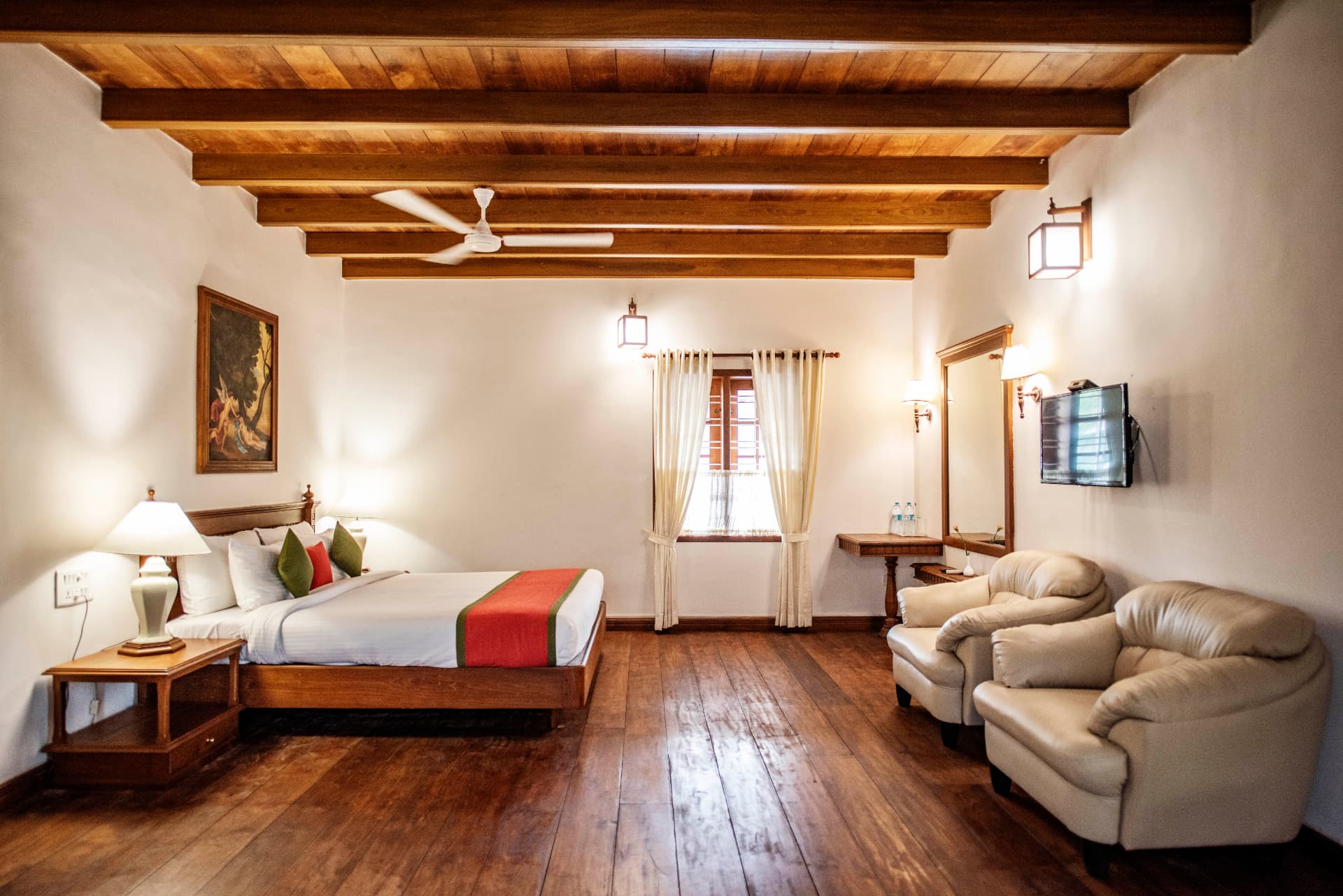 Heritage Classic room with timber-beamed ceiling and king bed