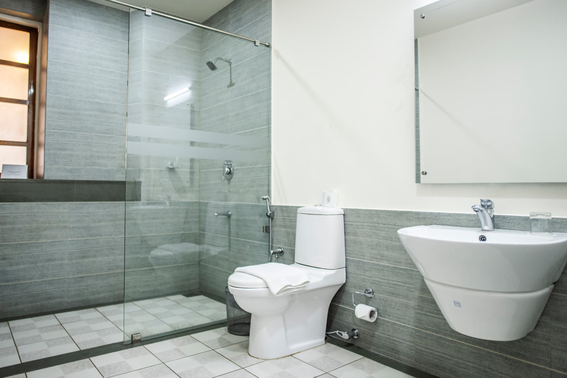 En-suite bathroom with glass walk-in shower