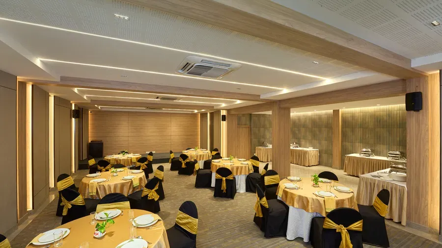 Banquet hall at Abad Fort set with round tables