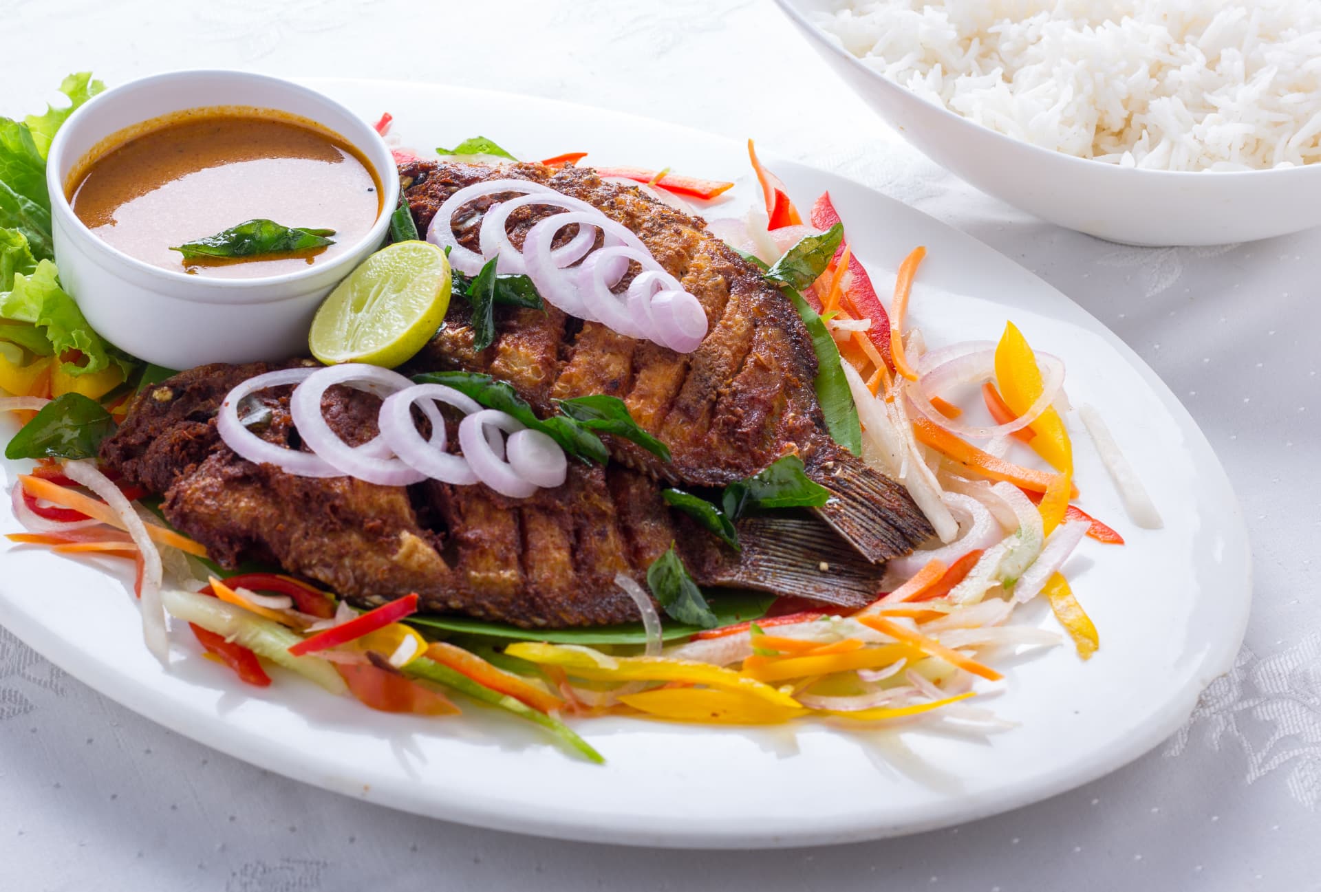 Kerala fish fry with curry and steamed rice