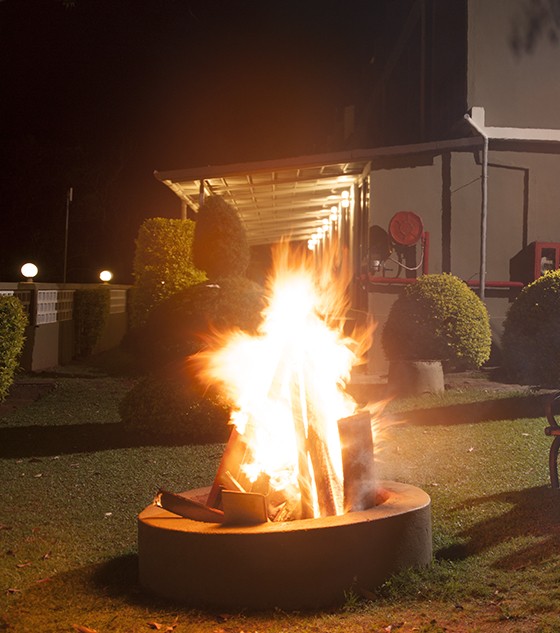Campfire on the lawn at Abad Copper Castle