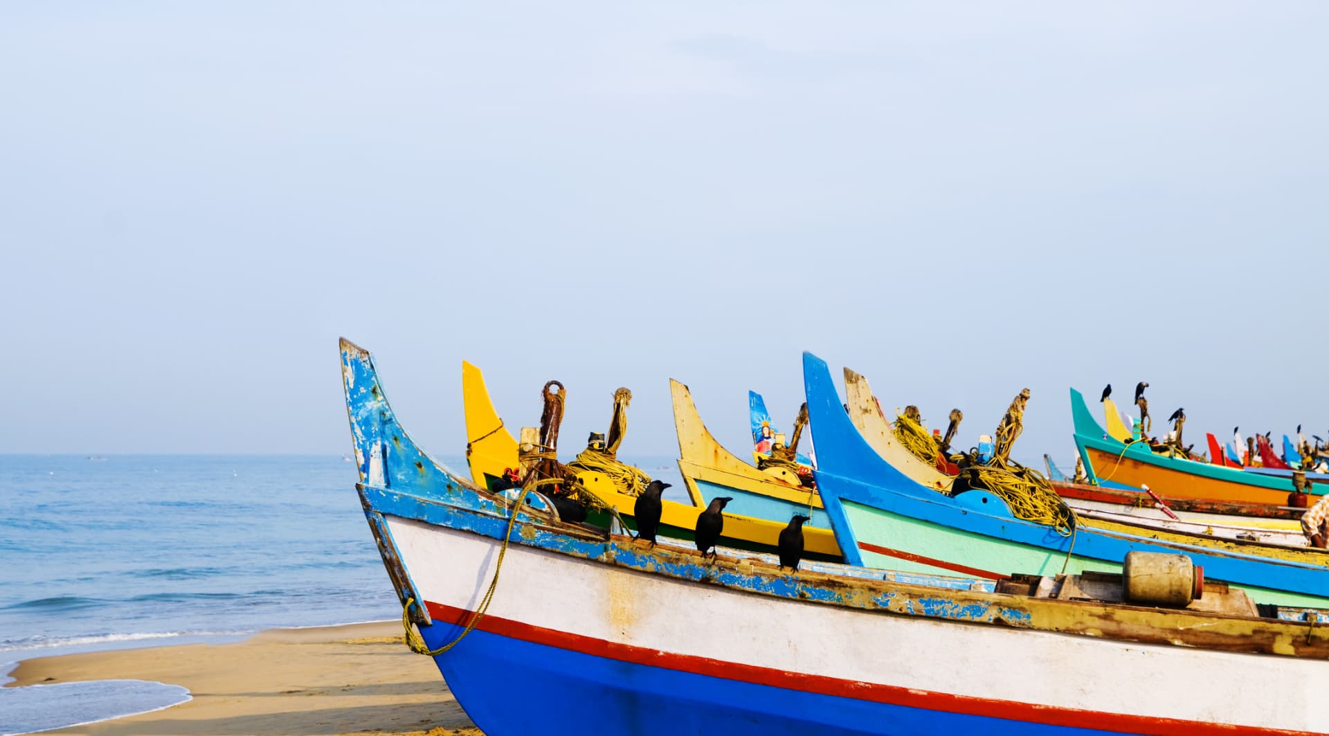 Painted fishing boats on the Kochi coast