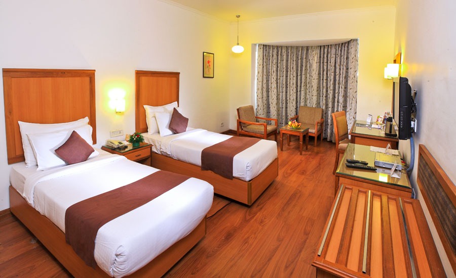 Superior Room with twin beds and timber flooring