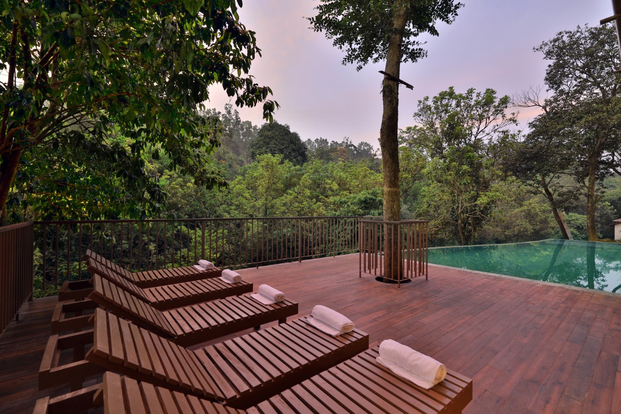 Pool sun deck – Abad Brookside Lakkidi, Wayanad
