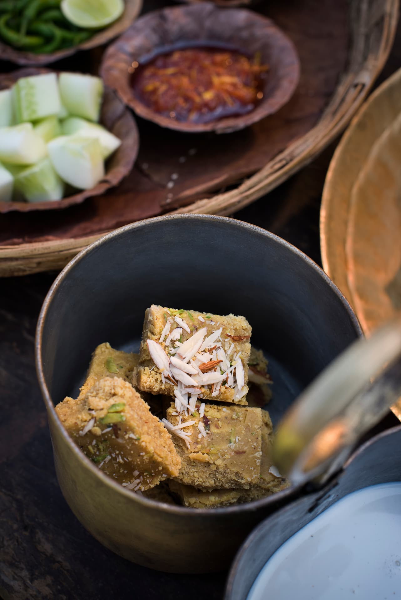 Mohanthal, cut and dusted with nuts